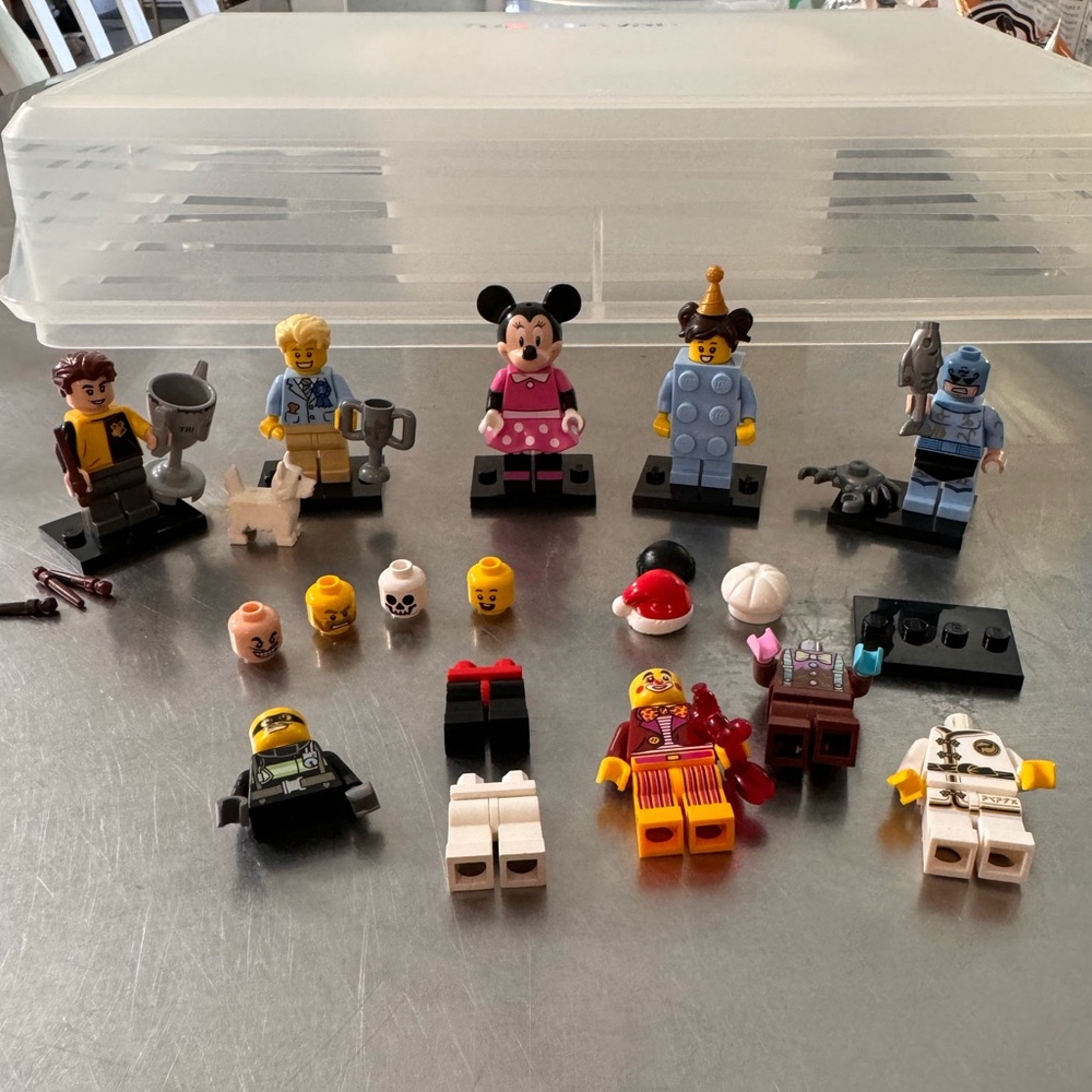 Assortment of Lego Mini Figures and pieces